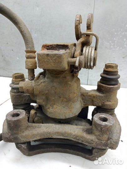 Суппорт задний правый Kia Spectra седан S6D.1.6