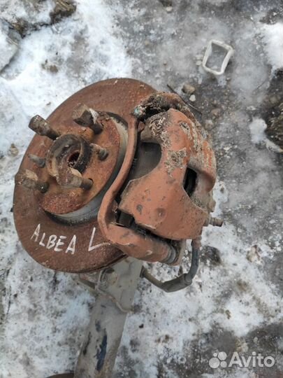 Тормозной суппорт передний левый Fiat Albea