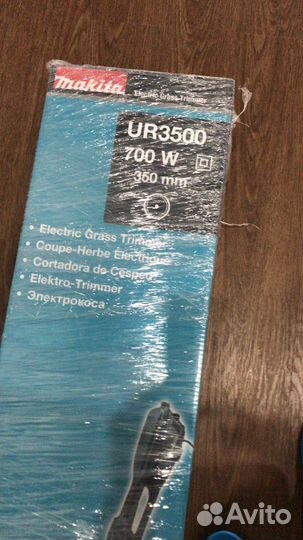 Триммер электрический новый