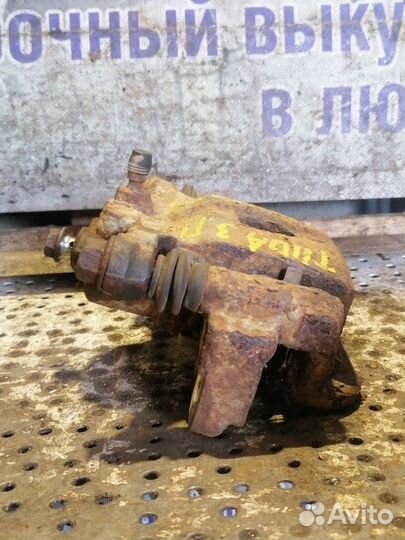 Суппорт тормозной задний правый Nissan Tiida