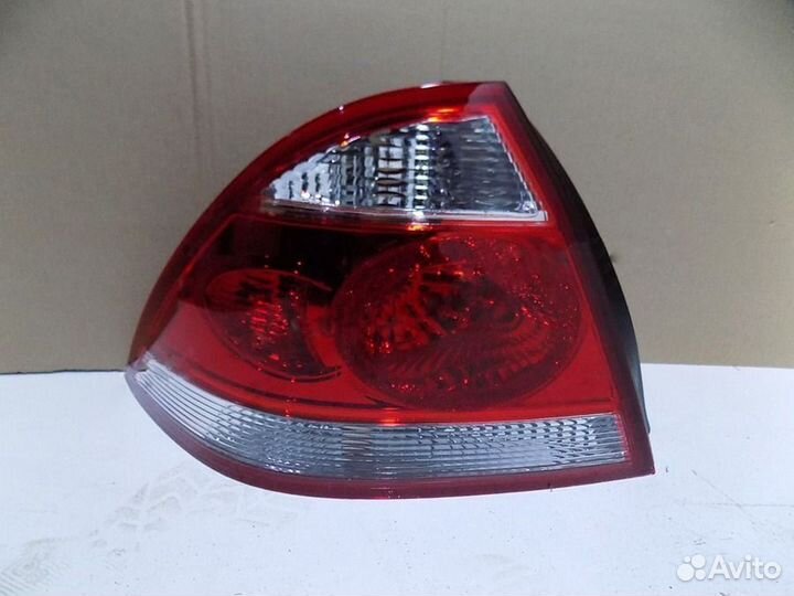 Фонарь задний левый Ниссан Альмера Классик 2007-13