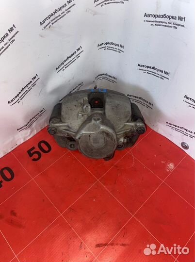 Суппорт тормозной передний левый Mercedes-Benz