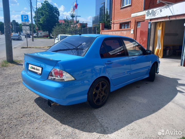 Mitsubishi Lancer 2.0 МТ, 2004, 2 000 км