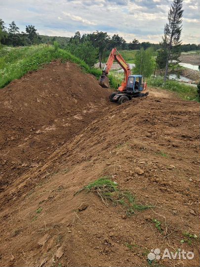 Услуги экскаватора колесного полноповоротного