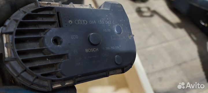 Дроссельная заслонка Vw Audi 1.8t 06A133062C