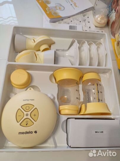 Молокоотсос medela swing maxi flex