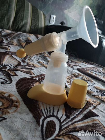 Молокоотсос medela ручной