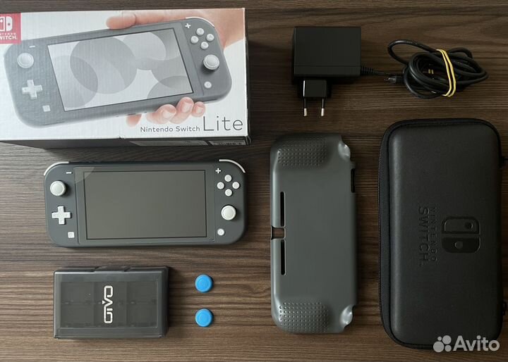 Nintendo Switch Lite серая. Полный комплект