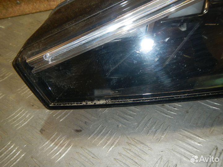 Фара левая Skoda Rapid