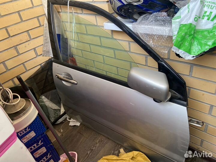 Дверь правая Лансер цедия