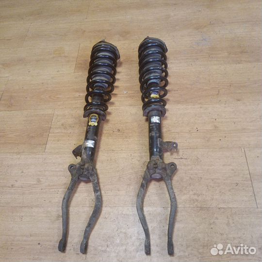 Передние стойки mazda 6 gg