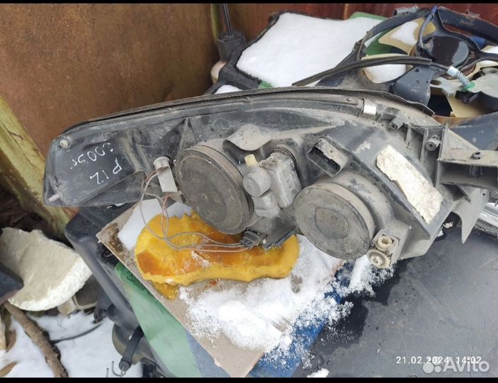 Фара левая Nissan Primera P12