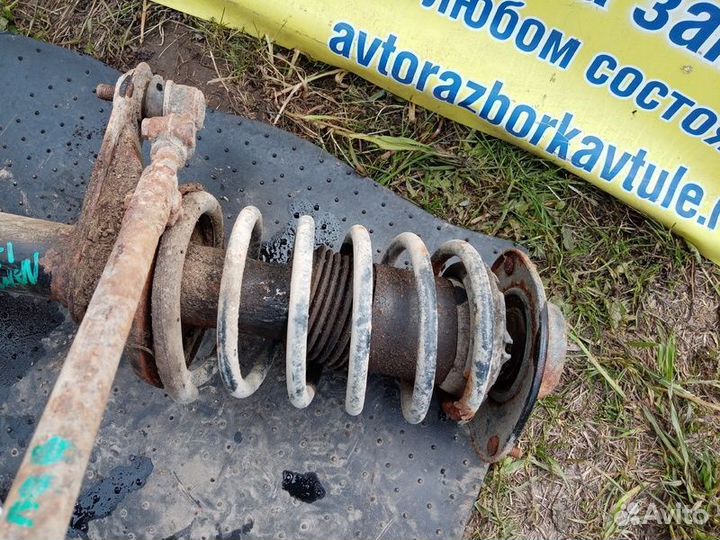 Стойка амортизатора переднего левого Chevrolet Lan