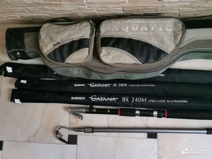 Пакетом: 4 удилища Shimano, багор, чехол
