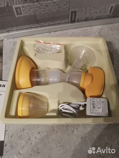 Молокоотсос электрический maman