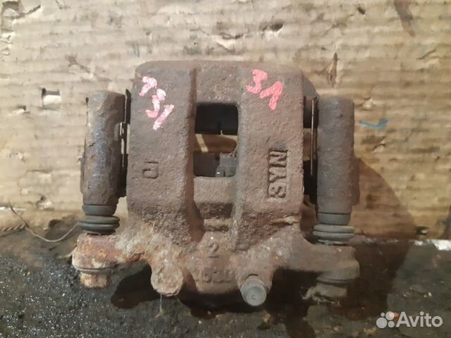 Суппорт тормозной задний левый Nissan X-Trail