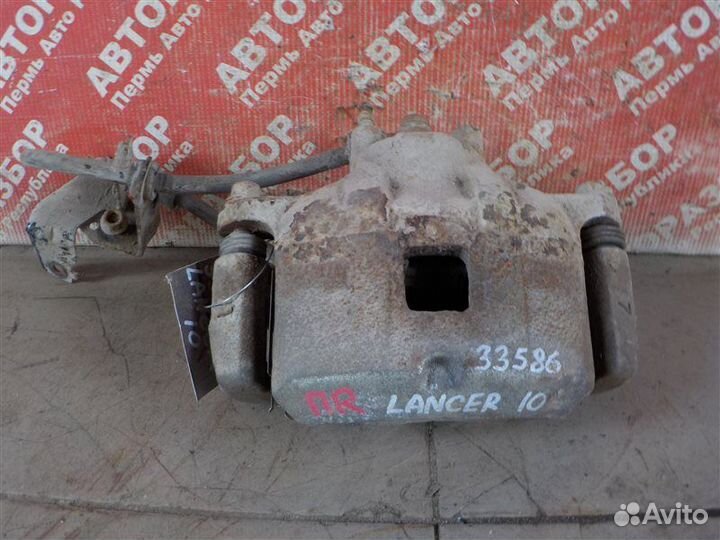 Суппорт тормозной передний правый Mitsubishi