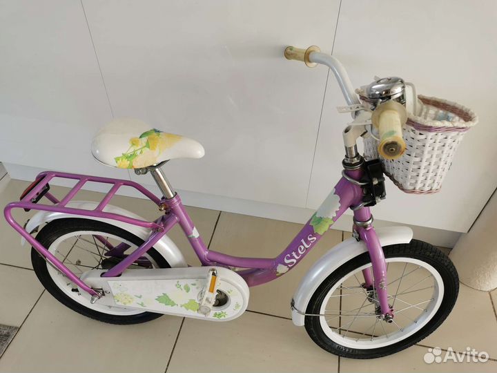 Детский велосипед с боковыми колесами