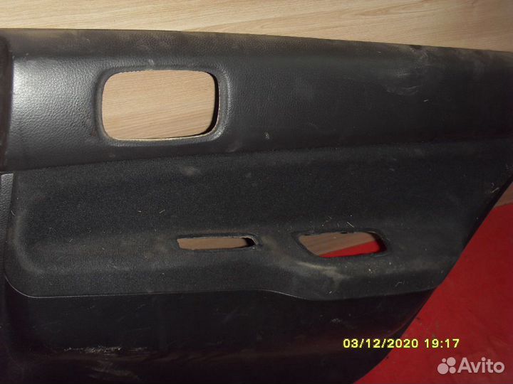 Обшивка задней двери MR444252 Mitsubishi Lancer 9