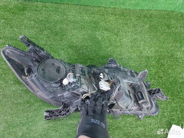 Фара левая Mitsubishi Pajero Sport