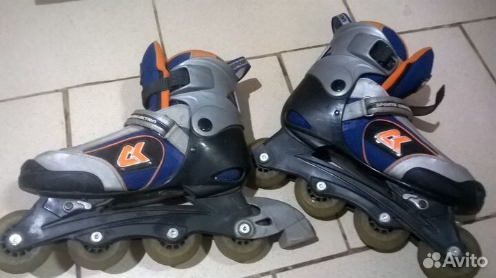 Роликовые коньки