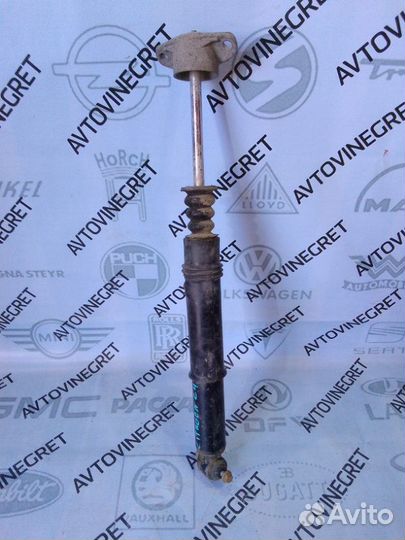 Стойка амортизатор задний Citroen C4