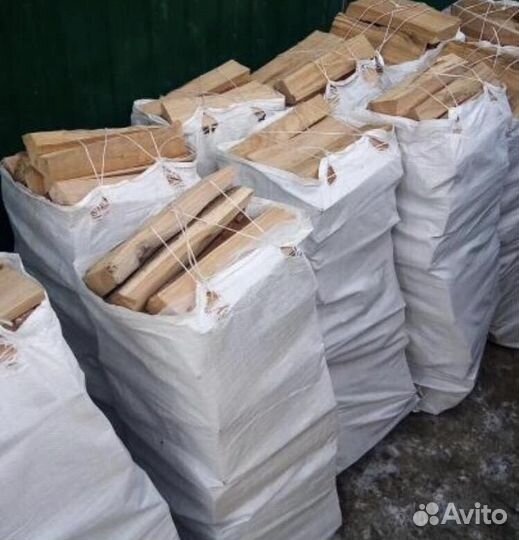 Сухие дрова в мешках