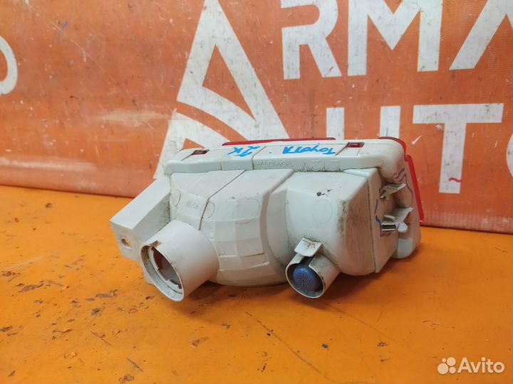 Фонарь противотуманный задний левый Toyota Land