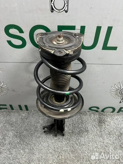 Стойка амортизатора передняя левая Nissan Teana