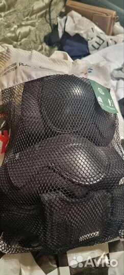 Защита для роликов Dekathlon новая