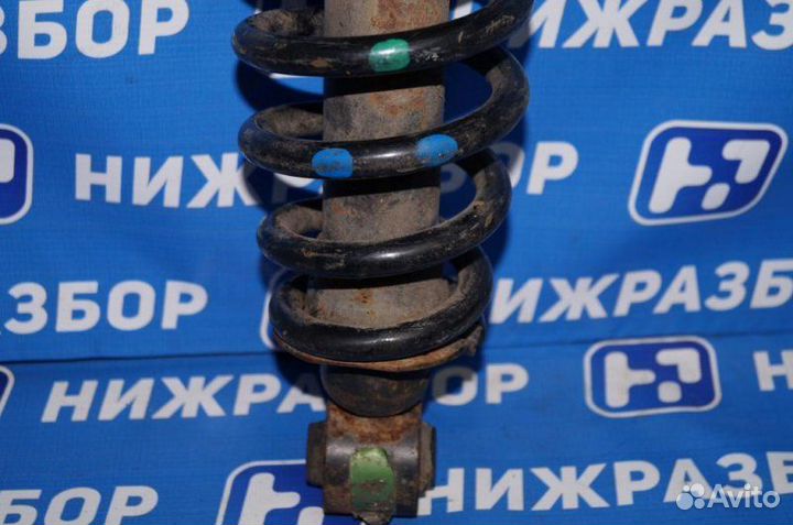 Амортизатор задний левый Toyota Avensis 2