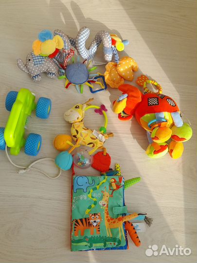 Развивающие игрушки для малышей до года