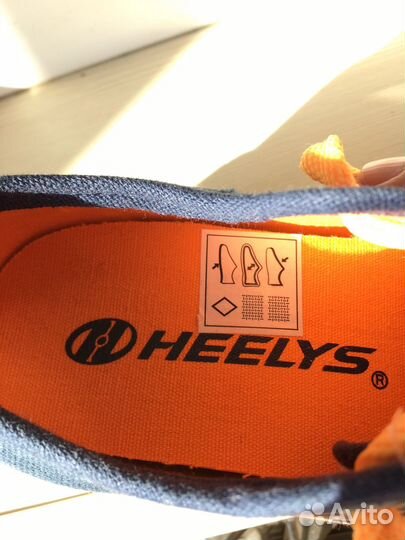 Кроссовки на роликах heelys