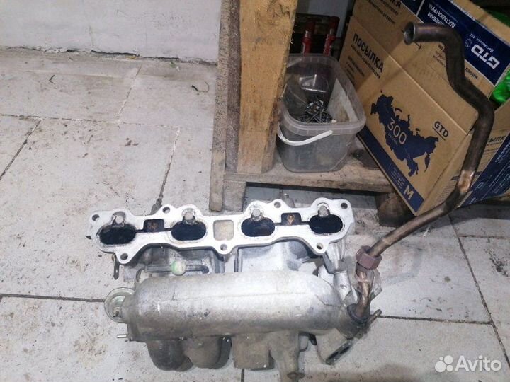 Впускной коллектор Mazda 323 BJ14M5 FP