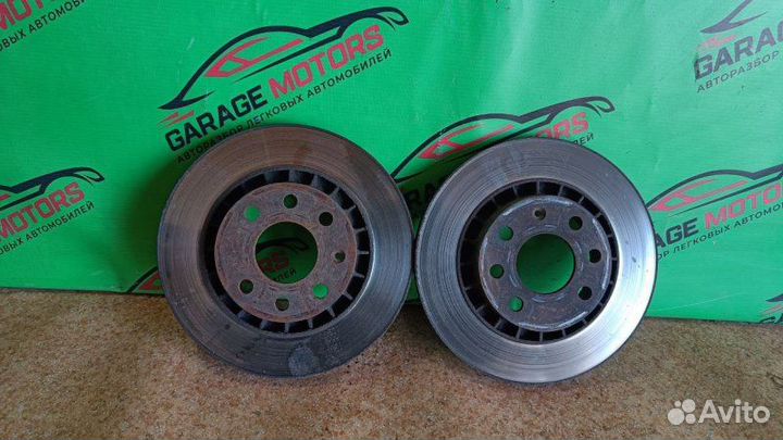 Диск тормозной Daewoo Nexia седан 1 2004