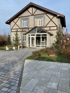 Дом 240 м² на участке 12 сот.