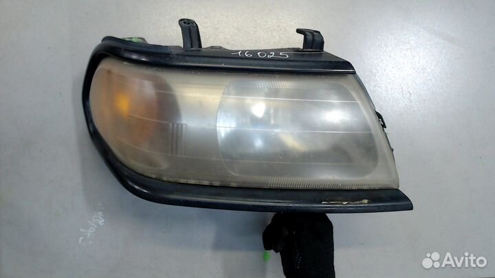 Фара (передняя) Mitsubishi Montero Sport / Pajero