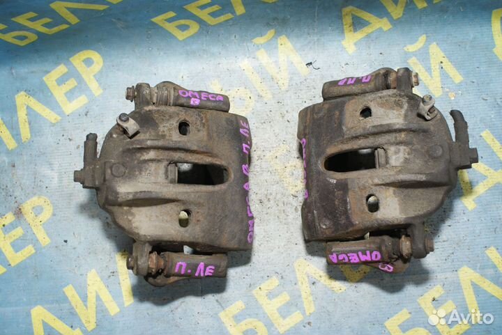 Суппорт тормозной передний Opel omega B