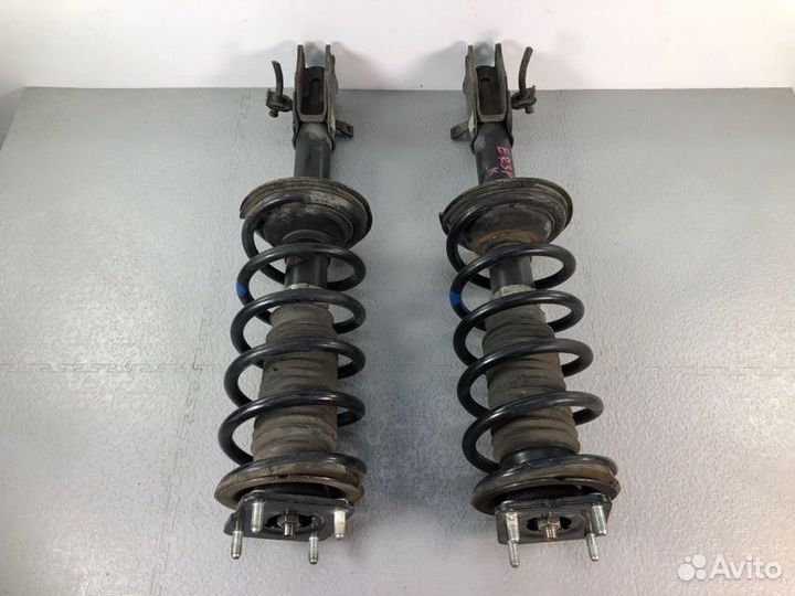 Стойка передняя оригинал Mazda CX7 ER 4wd б/п L+R