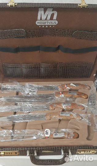 Набор ножей и вилок в чемодане