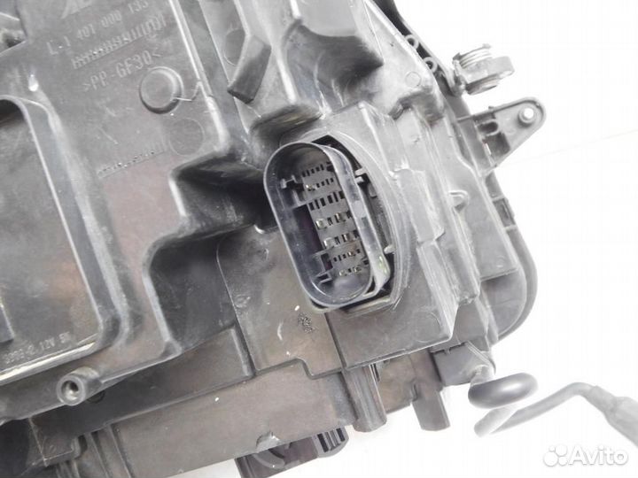 Фара левая Volkswagen Tiguan