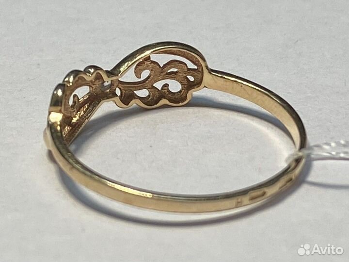 Кольцо с камнями золотое
