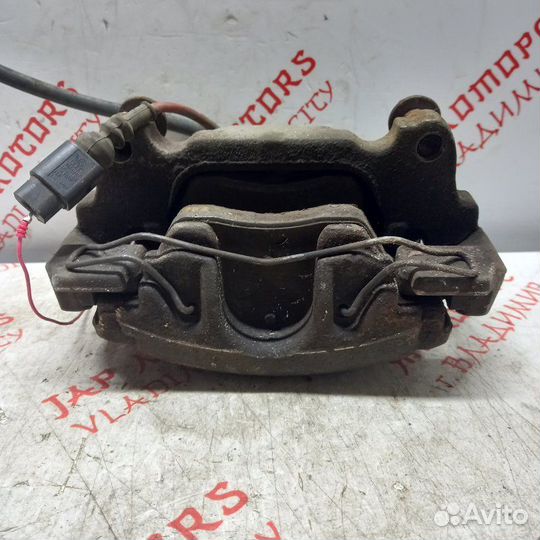 Суппорт тормозной передний левый Volkswagen Touran