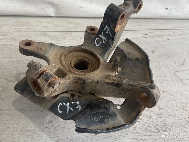 Mazda CX-7 Цапфа передня (R,L)