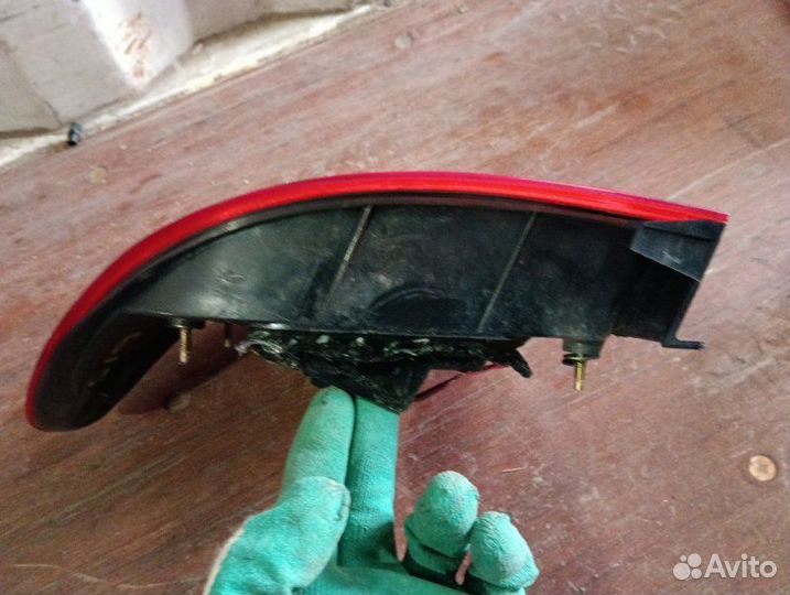 Стоп-сигнал левый Nissan Bluebird Sylphy TG10