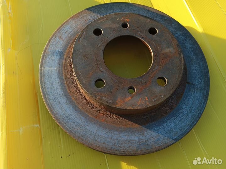 Тормозной диск на Ниссан примера 11