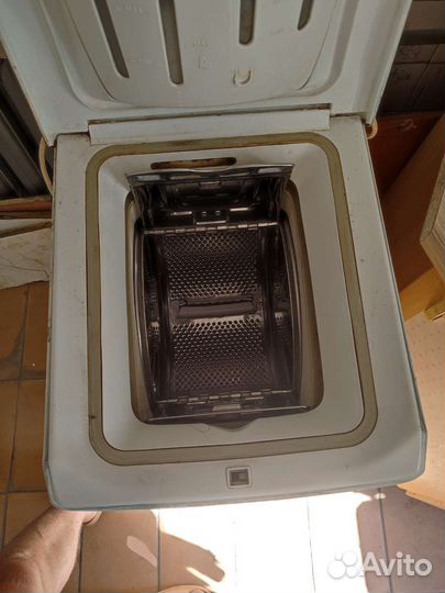 Вертикальная стиральная машина Ariston ATD 104