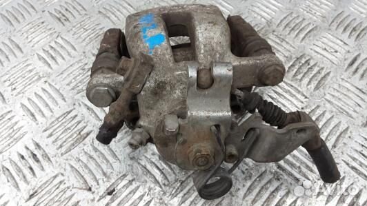 Суппорт тормозной задний правый opel zafira B (UML