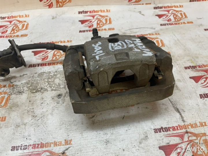 Суппорт тормозной задний левый Mazda Cx-9 TB CY