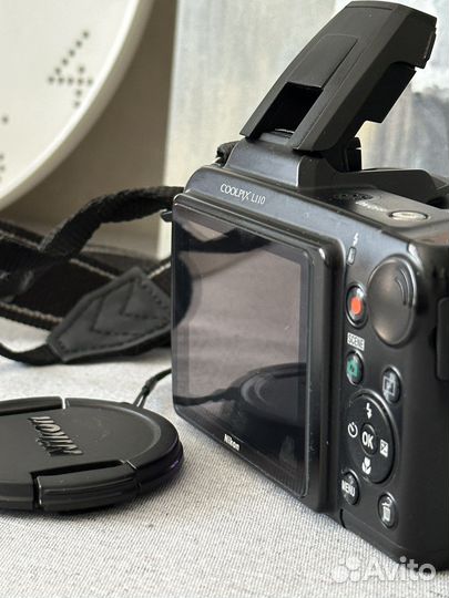 Зеркальный фотоаппарат Nikon Coolpix L110